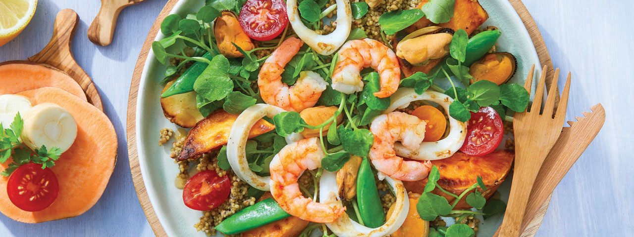 Salade de fruits de mer aux légumes rôtis et vinaigrette à la moutarde