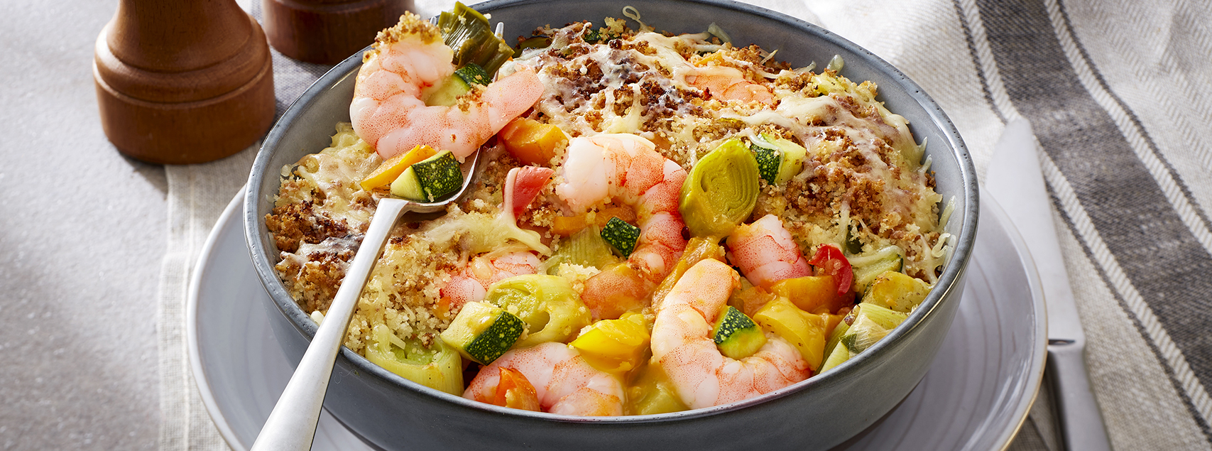 Crumble de crevettes et légumes gratinés